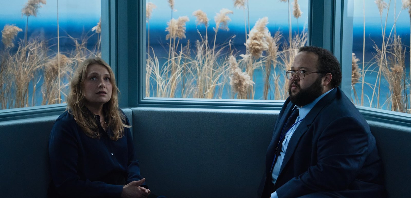 Merritt Wever and Zach Cherry in‌ Severance ⁤Season 2