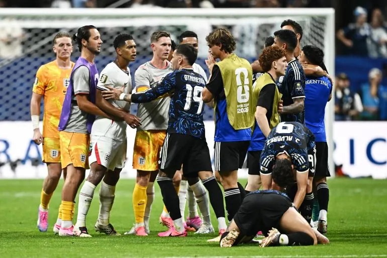 Soccer Football - FIFA World Cup 2026 - Semi Final - England v Argentina - Atlanta Stadium, Atlanta, Georgia, U.S. - July 15, 2026 Argentina's Nicolas Otamendi clashes with England's Jude Bellingham at the end of the match REUTERS/Dylan Martinez